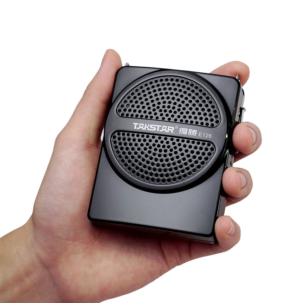 Takstar E126 Portable Voice Amplifier held in a hand
