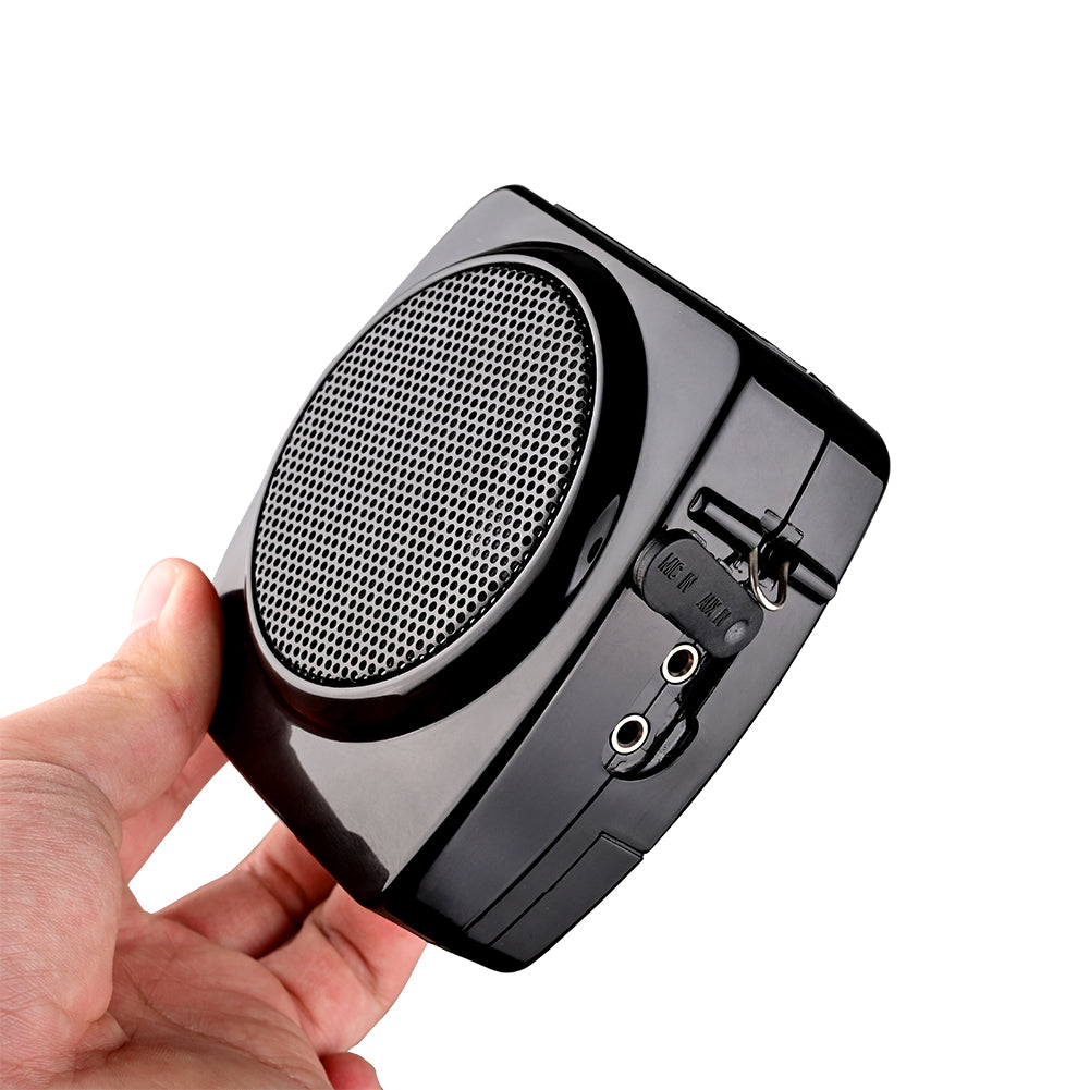 Takstar E6 Portable Voice Amplifier held in a hand